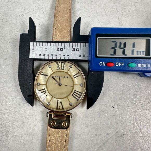 Anne Klein Watch Womens 34mm Round MOP Dial Embossed Band Gold Tone New Battery - Picture 10 of 11